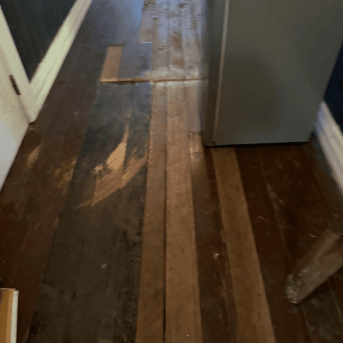 Original hardwood floors in need of restoration